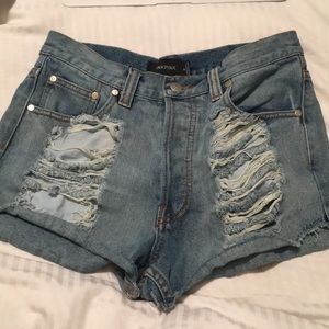 mink pink denim distressed shorts from nasty gal